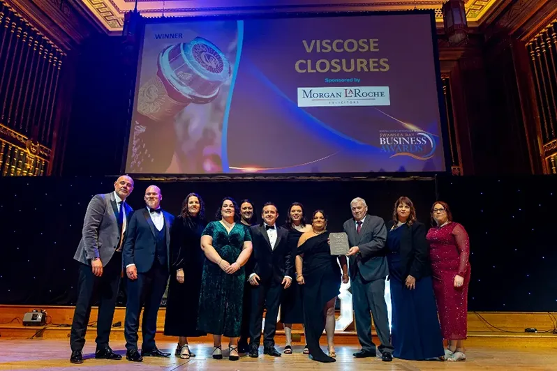 Viscose team on stage winning award
